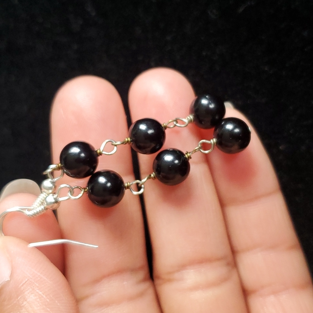 Black earrings.